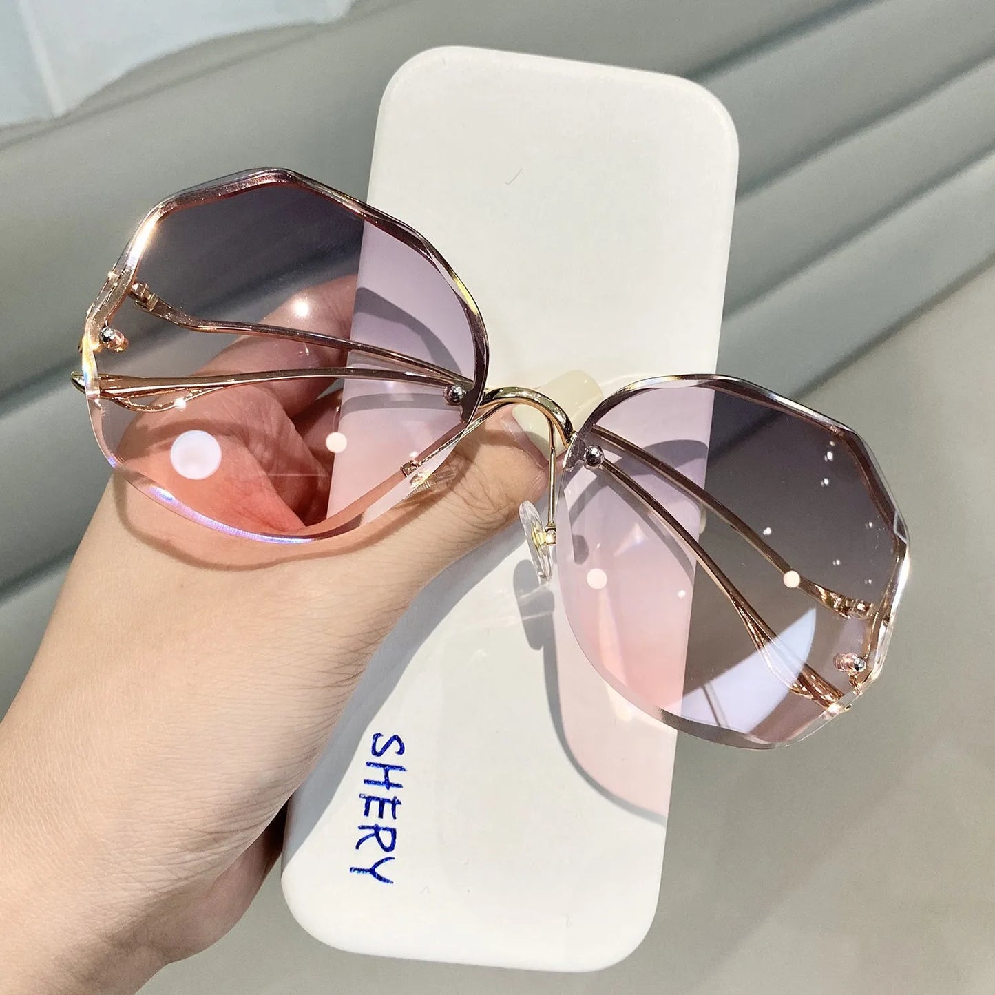 Trendy Fashionable Polygon Frameless Cut Edge Sunglasses Women's Metal Curved Legs Retro Street Photo Fashionglasses